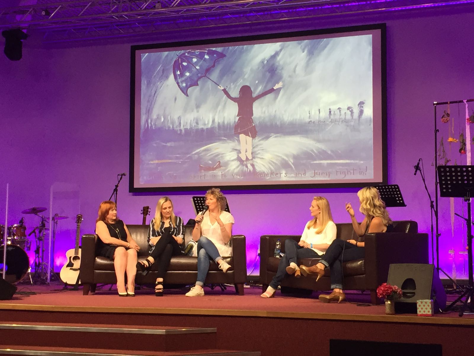Charlotte speaking at the captivate womans conference